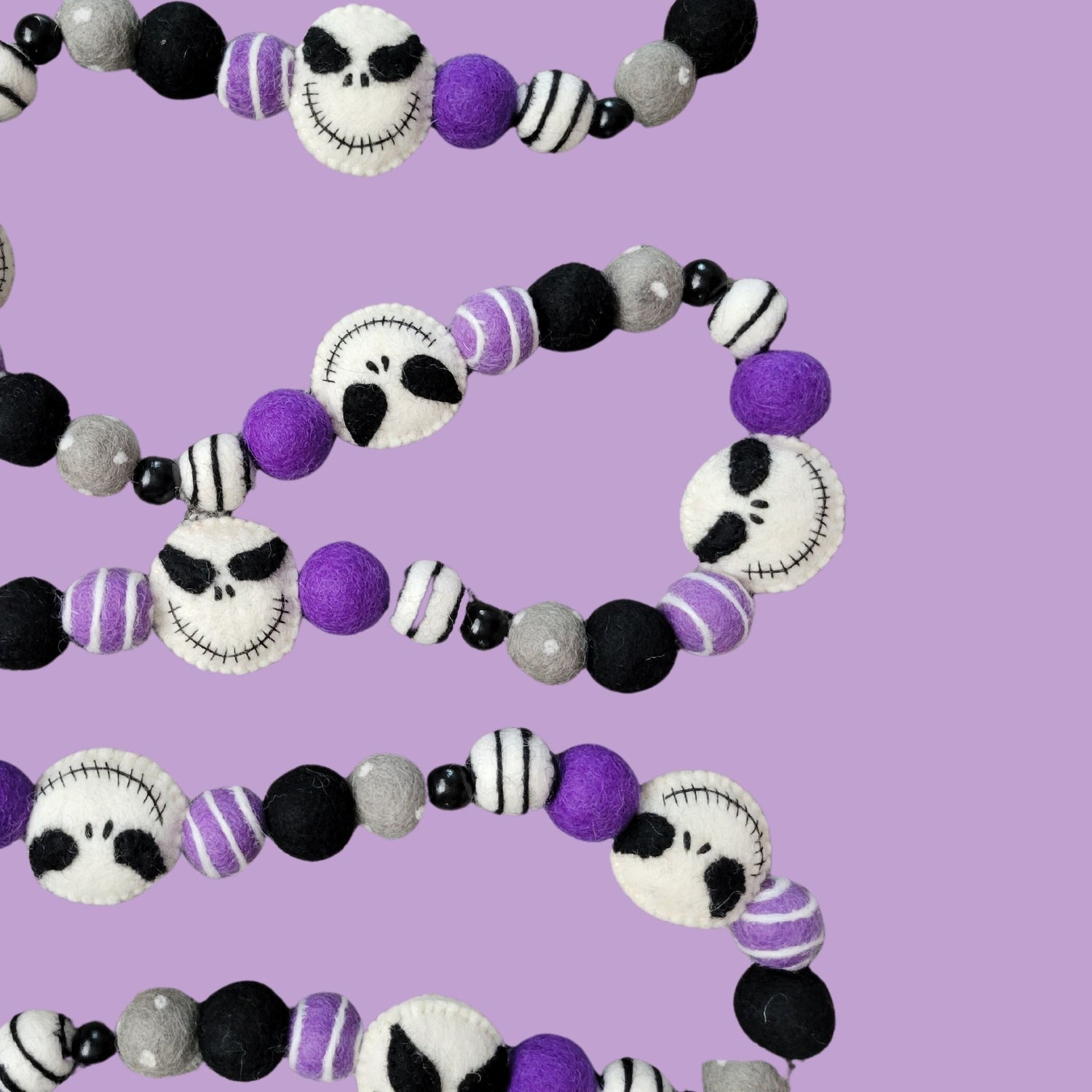 purple sticks and bones garland