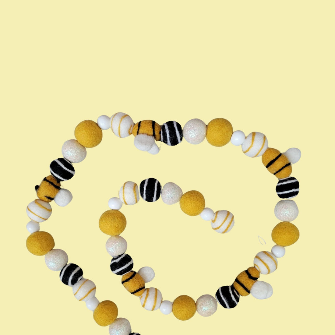 yellow and black hand-made bumblebee garland