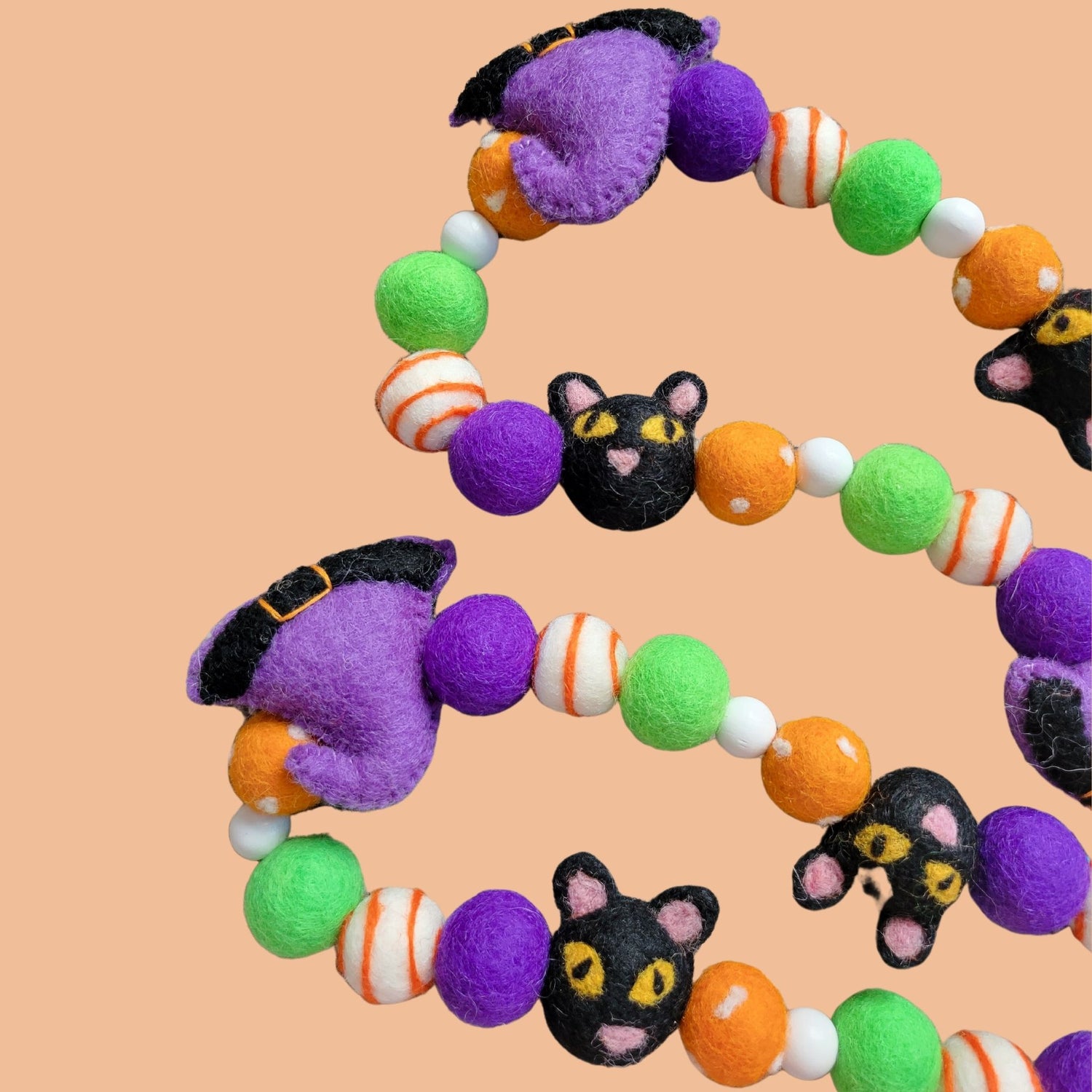 Halloween garland with black cats and witches hats