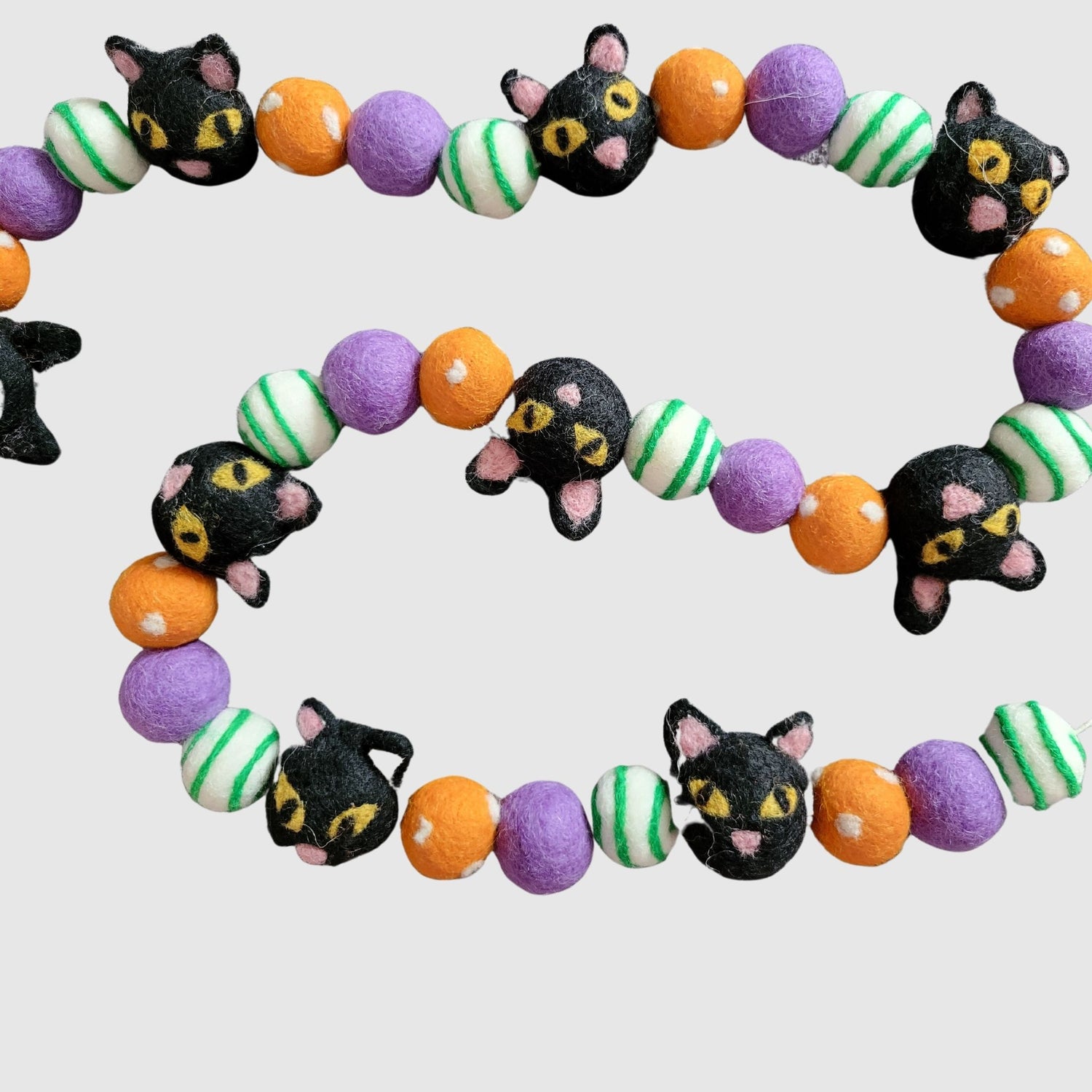 Black cats on a Halloween garland