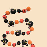 black and orange Halloween themed garland